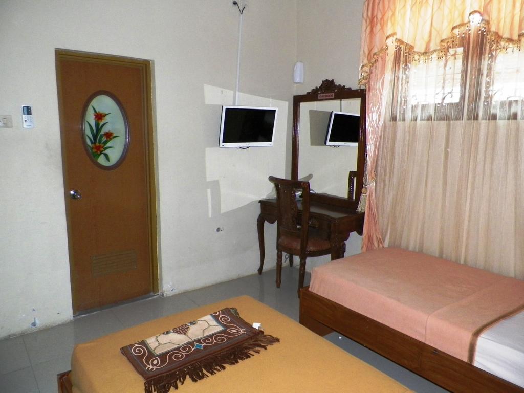 Hotel Madani Syariah Yogyakarta Szoba fotó